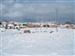 Vista del pueblo nevado desde las eras.