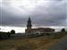 Día nublado sobre Iglesia y cementerio (Berrande)